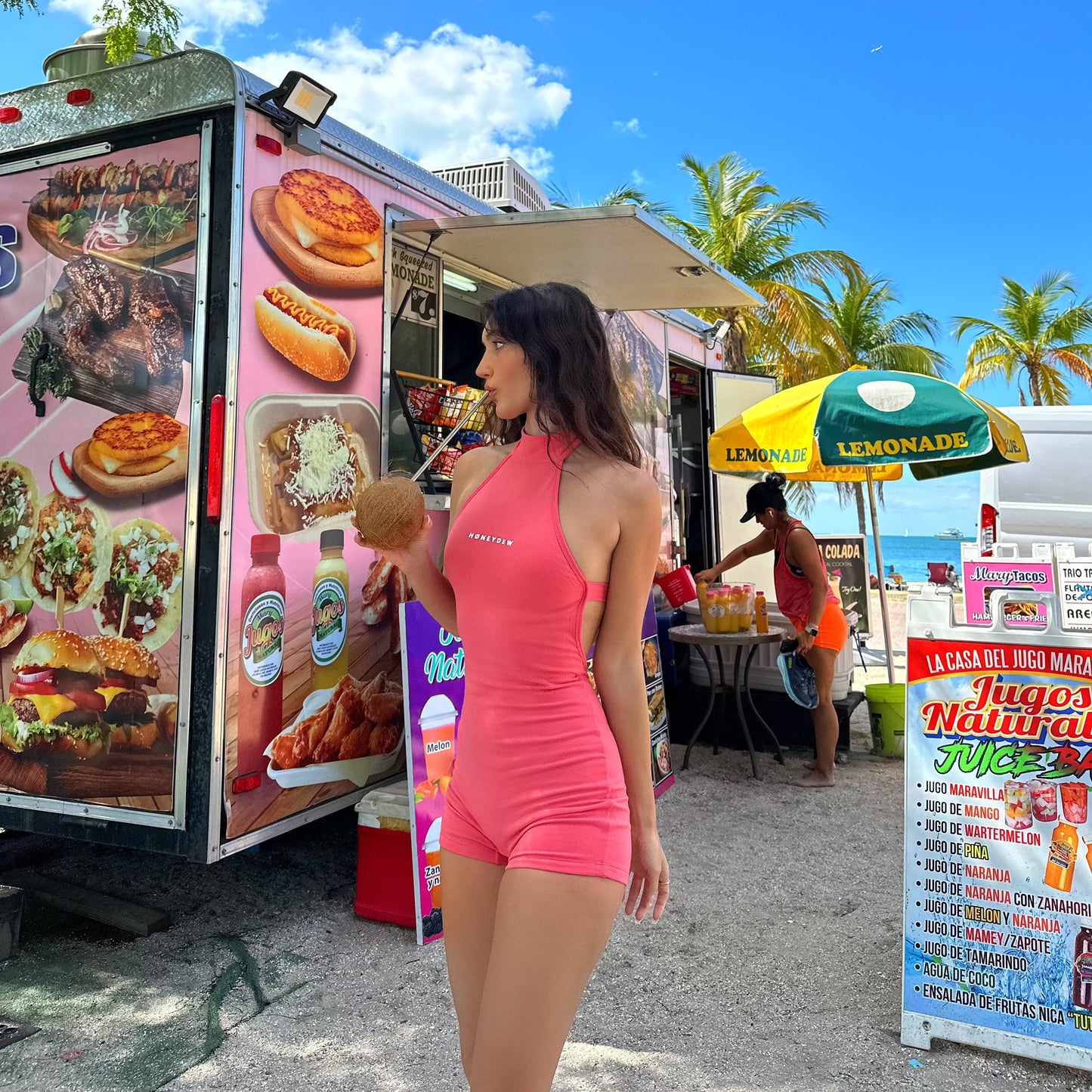 honeydew lounge girl wearing high neck fitted backless onesie playsuit