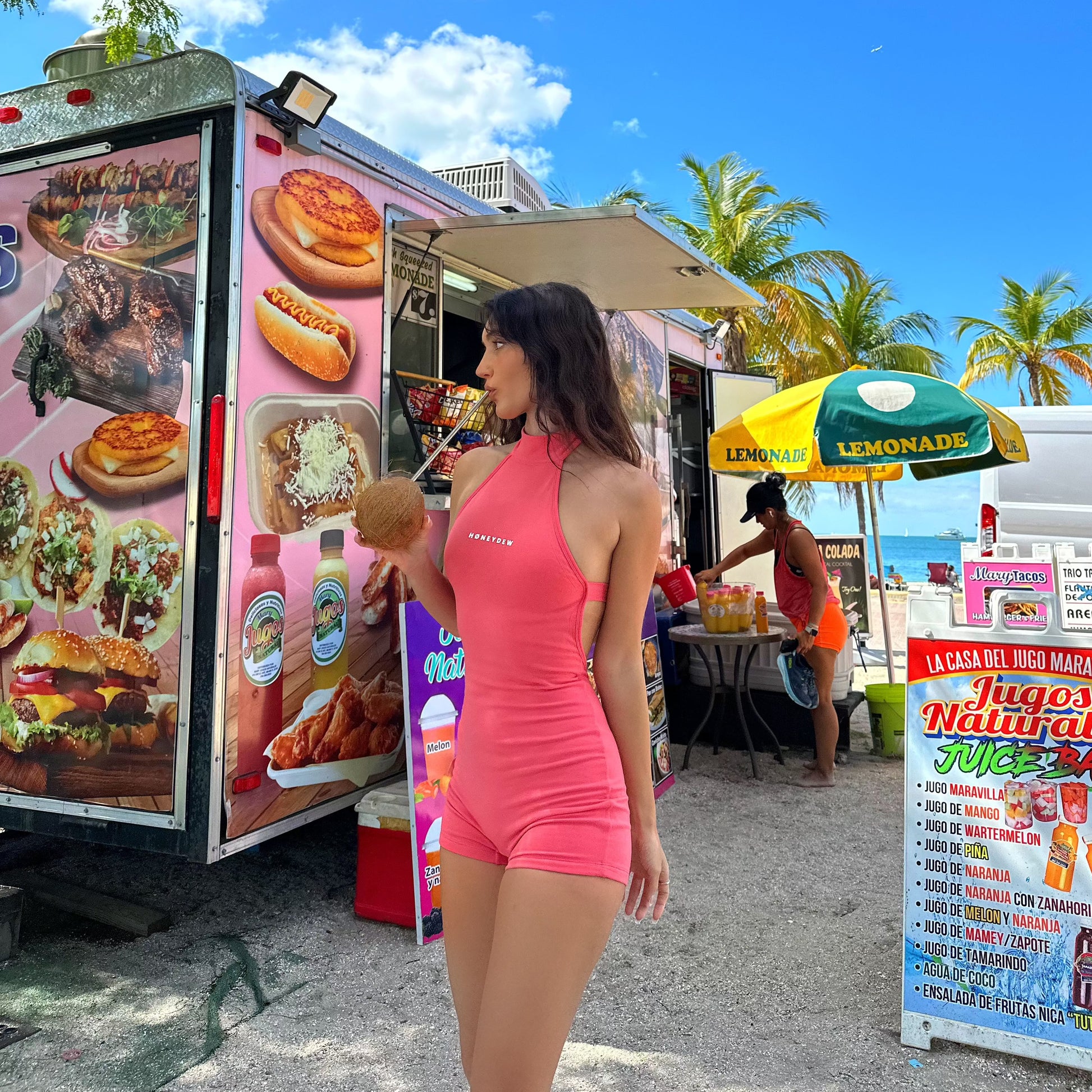 honeydew lounge girl wearing high neck fitted backless onesie playsuit